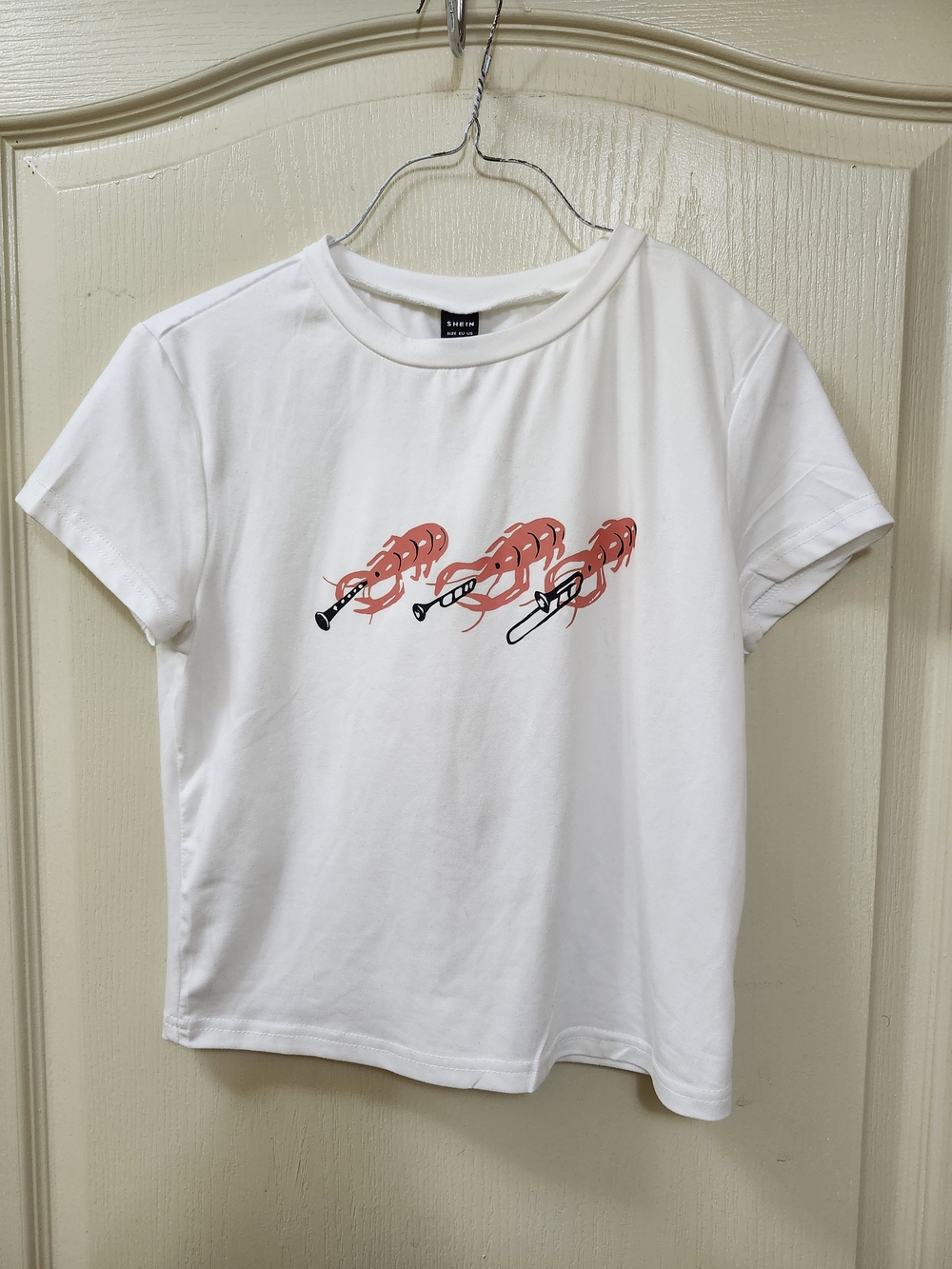 Kids White Graphic Tee with Coral Shrimp Design